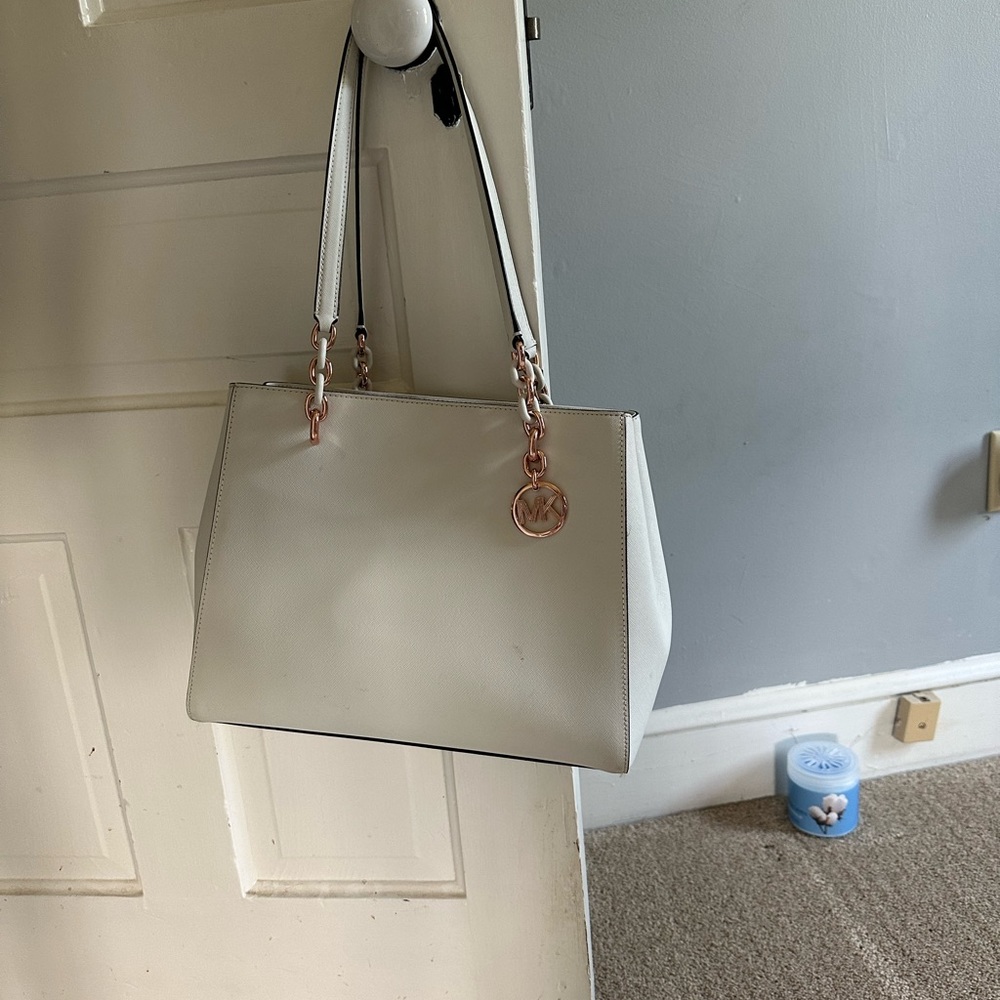 Medium sized Michael Kors tote with rose gold metal straps